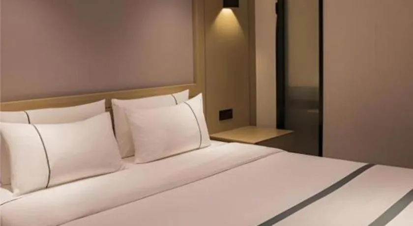 Bed in City Comfort Inn Hainan Tunchang Changsheng Road