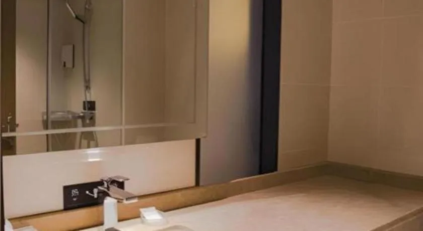 Bed in City Comfort Inn Hainan Tunchang Changsheng Road