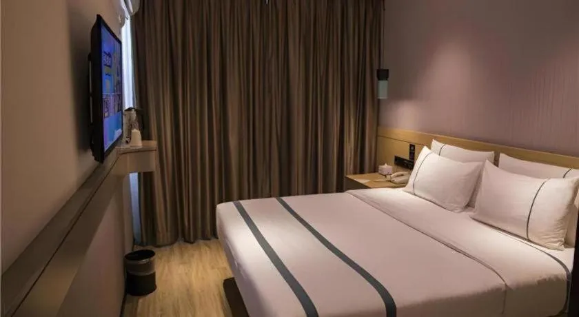 Bed in City Comfort Inn Hainan Tunchang Changsheng Road