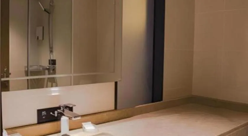 Bed in City Comfort Inn Hainan Tunchang Changsheng Road