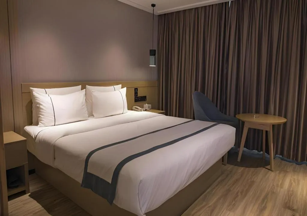 Bed in City Comfort Inn Hainan Tunchang Changsheng Road