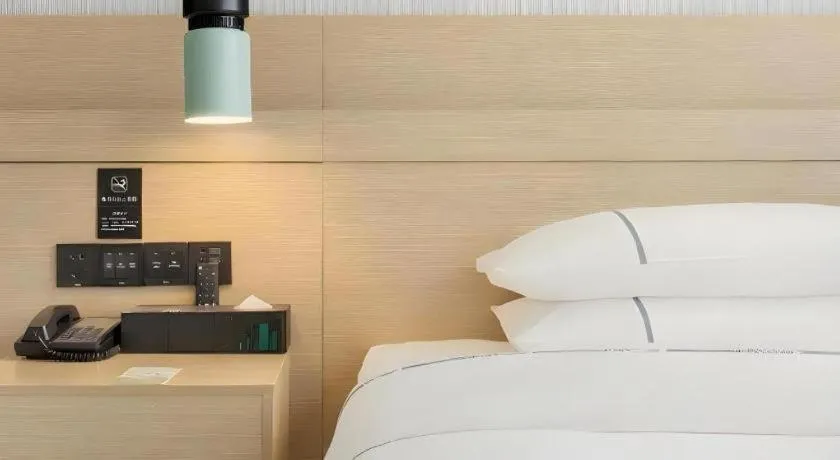 Bed in City Comfort Inn Hainan Tunchang Changsheng Road