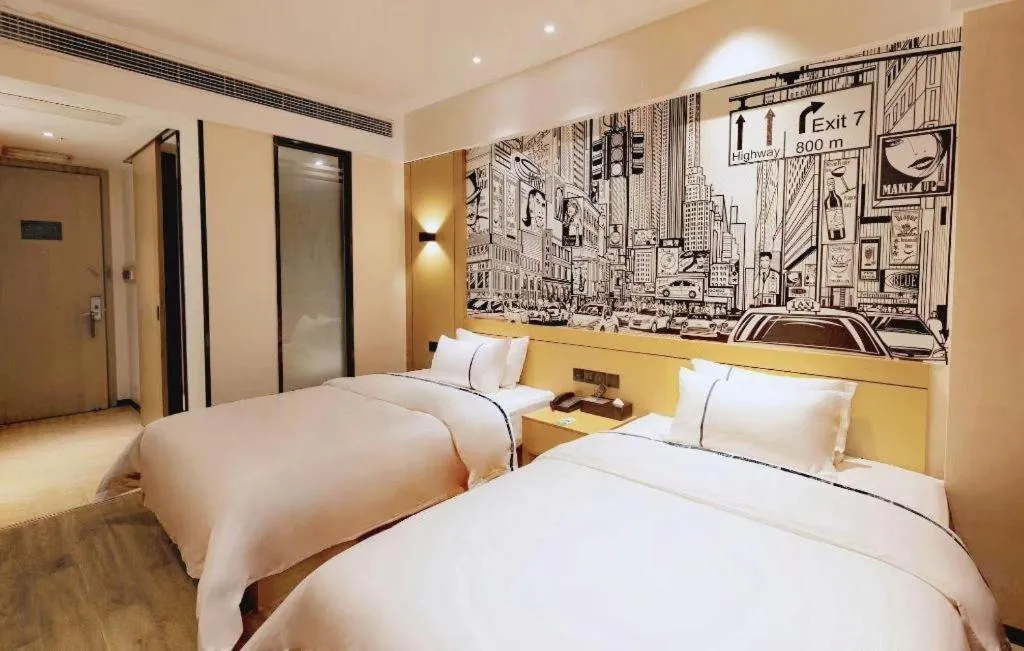 Bed in City Comfort Inn Meishan Wanda Plaza