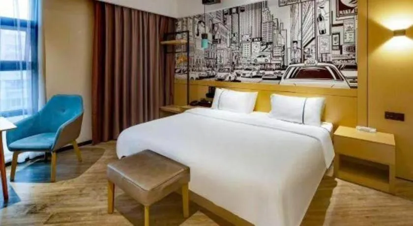 Bed in City Comfort Inn Meishan Wanda Plaza