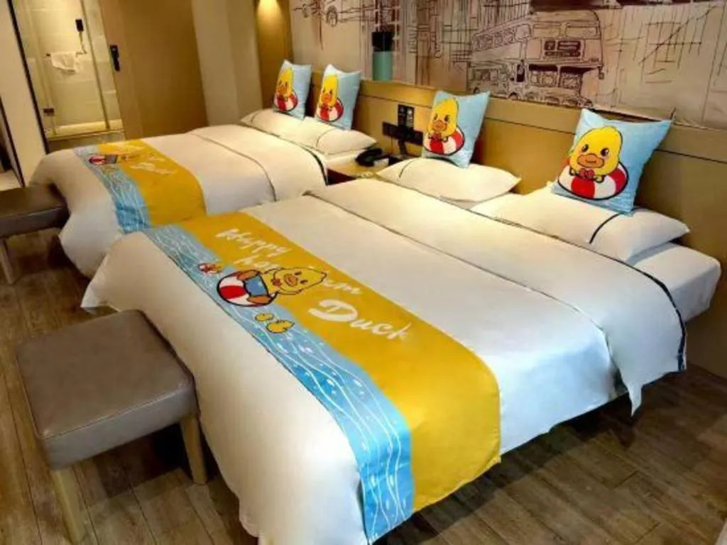 Bed in City Comfort Inn Meishan Wanda Plaza