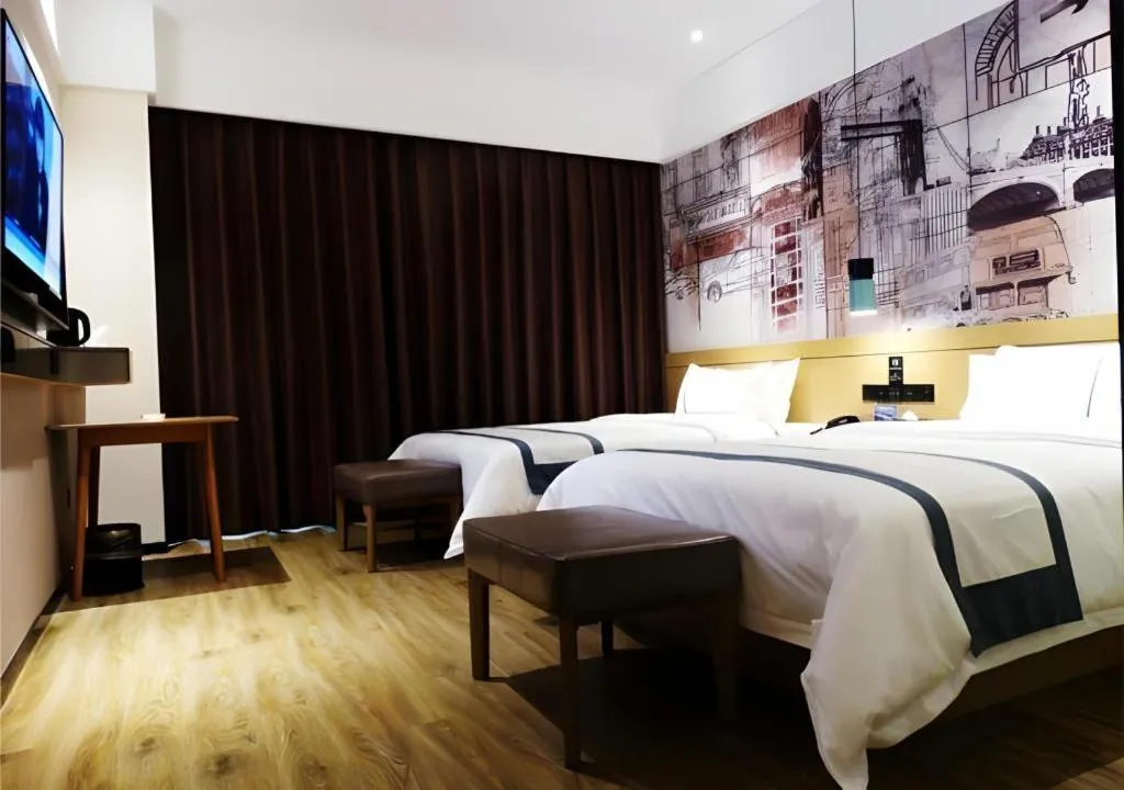 Bed in City Comfort Inn Meishan Wanda Plaza