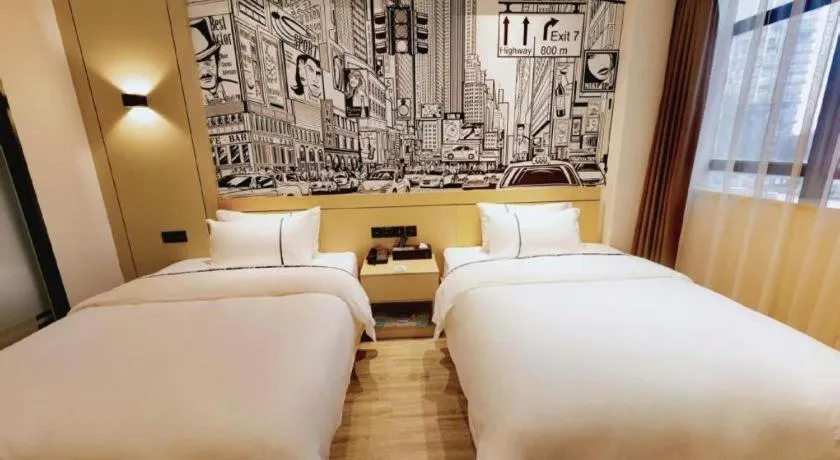 Bed in City Comfort Inn Meishan Wanda Plaza