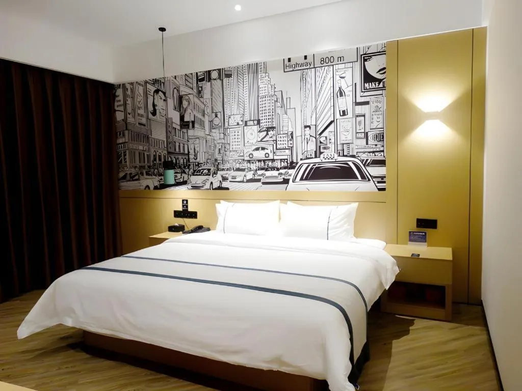 Bed in City Comfort Inn Meishan Wanda Plaza