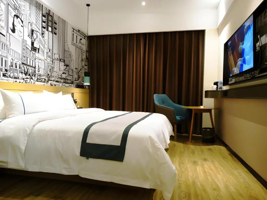 Bed in City Comfort Inn Meishan Wanda Plaza