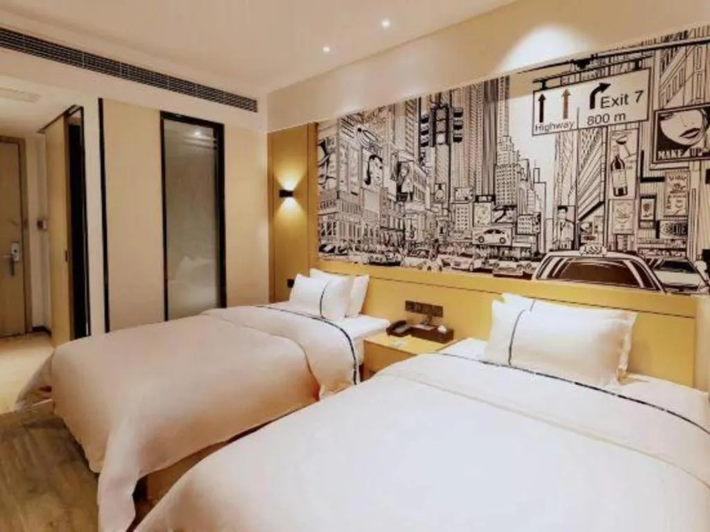 Bed in City Comfort Inn Meishan Wanda Plaza