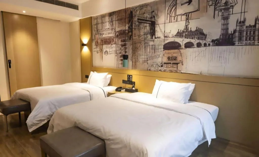 Bed in City Comfort Inn Meishan Wanda Plaza