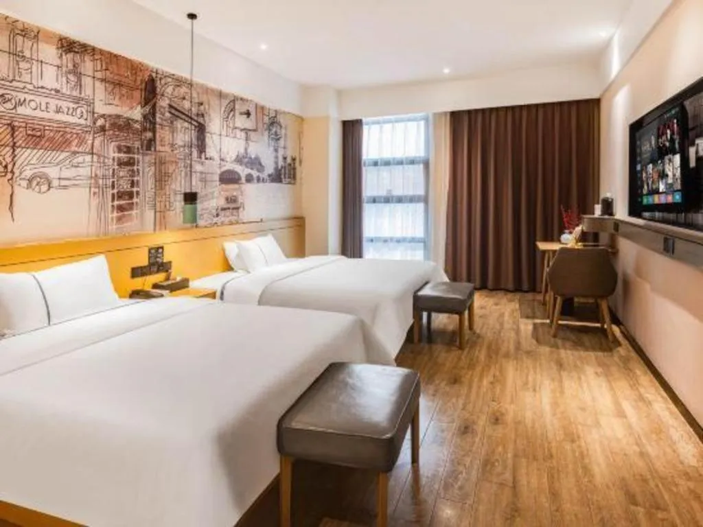 Bed in City Comfort Inn Meishan Wanda Plaza