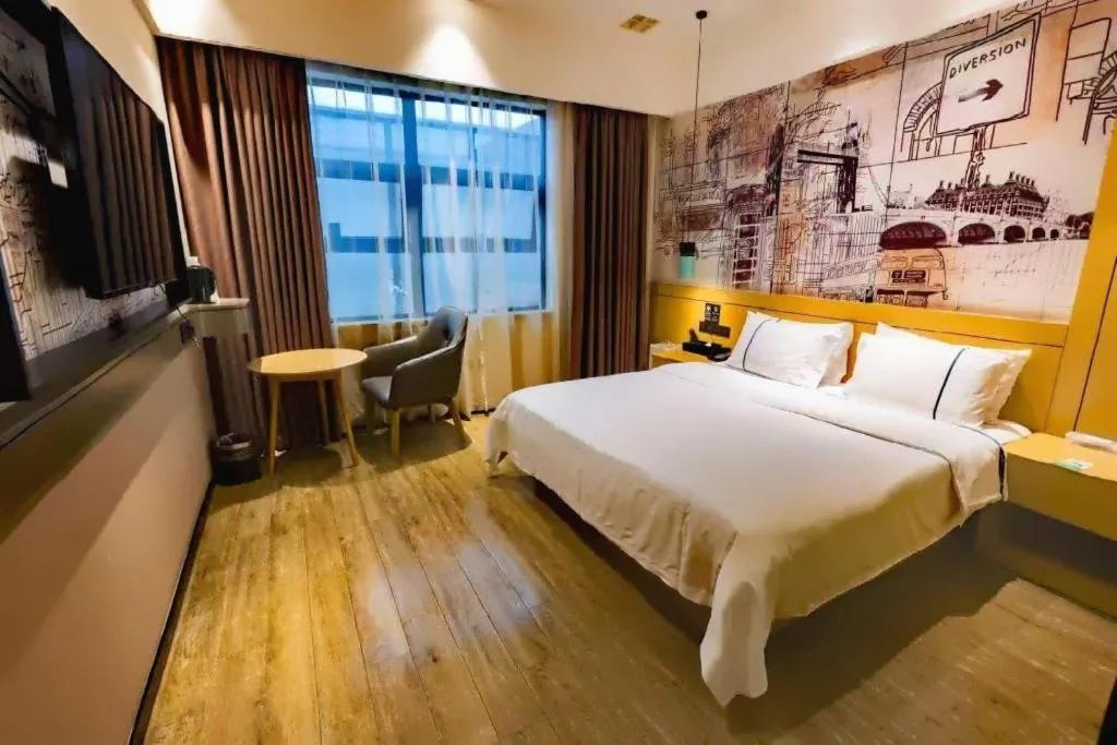 Bed in City Comfort Inn Meishan Wanda Plaza