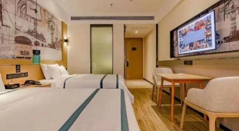 Bed in City Comfort Inn Meishan Wanda Plaza