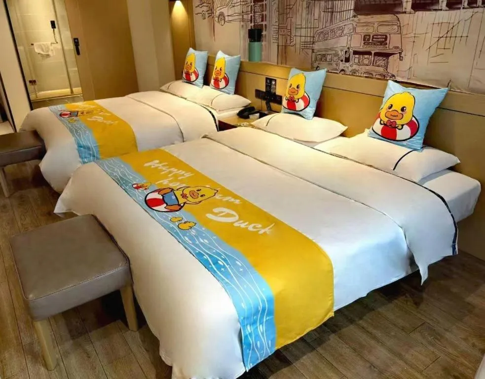 Bed in City Comfort Inn Meishan Wanda Plaza
