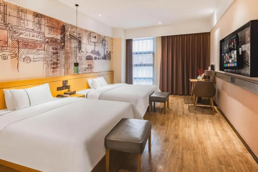 Bed in City Comfort Inn Meishan Wanda Plaza