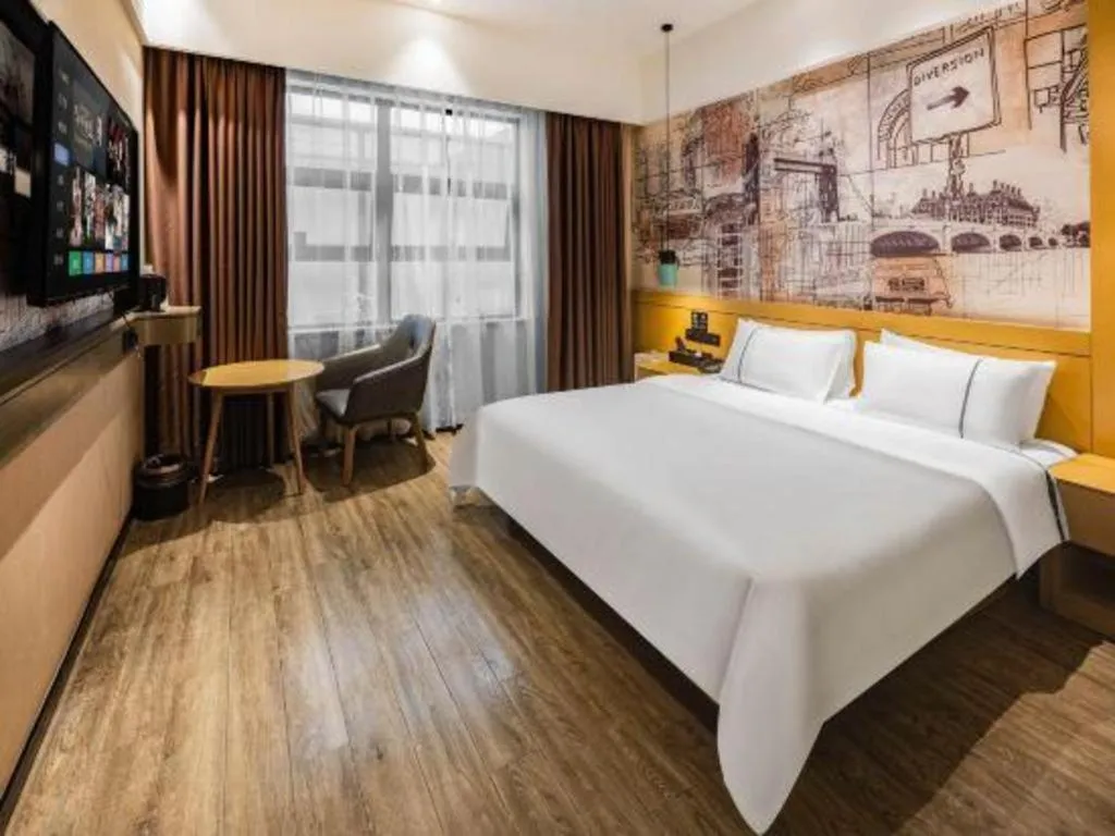 Bed in City Comfort Inn Meishan Wanda Plaza