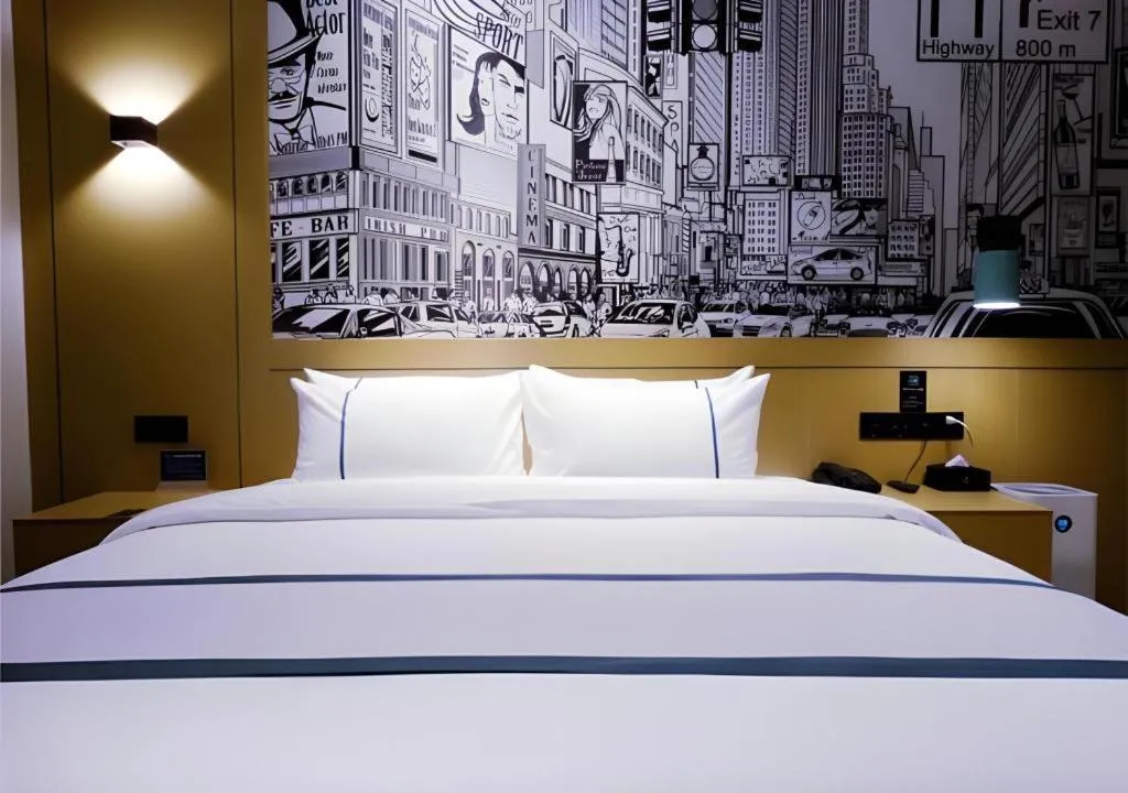 Bed in City Comfort Inn Meishan Wanda Plaza