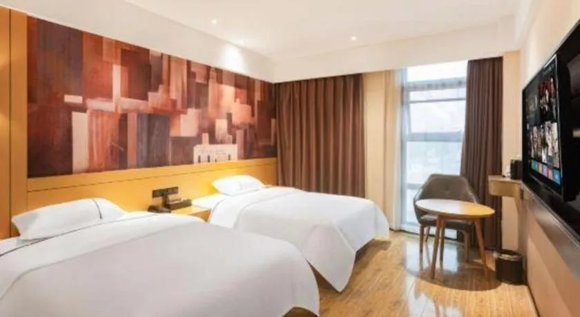 Bed in City Comfort Inn Meishan Wanda Plaza