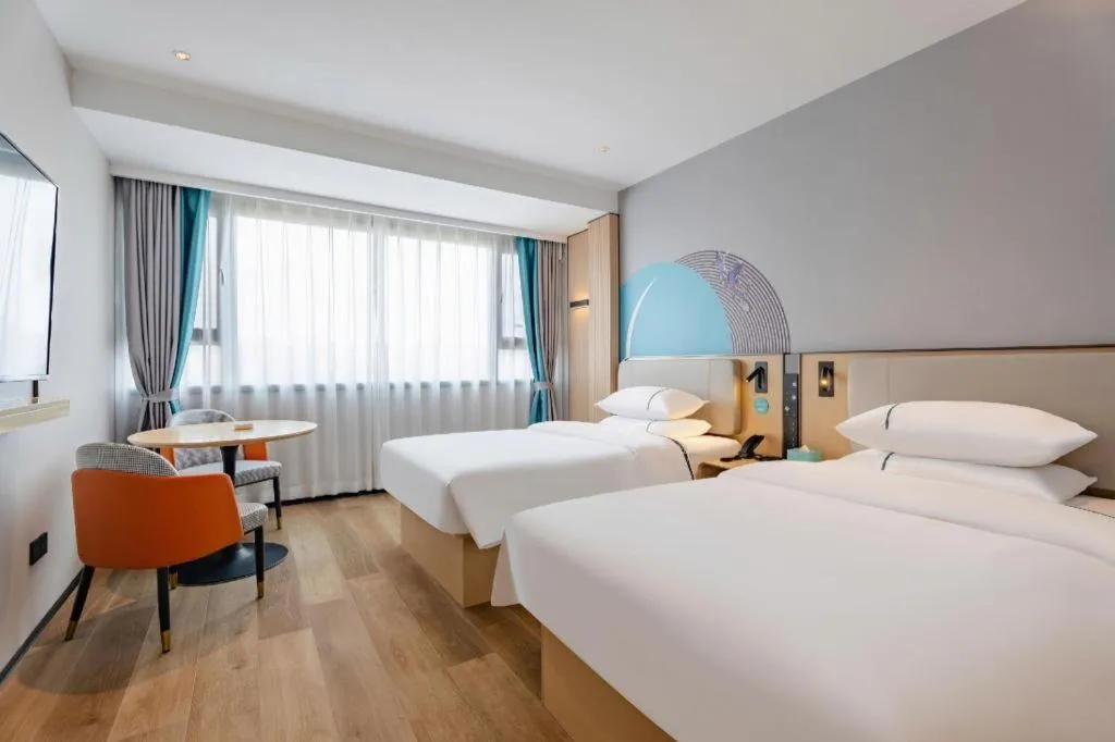 Bed in City Comfort Inn Guilin Jiatianxia Square International Conferences & Exhibition Center