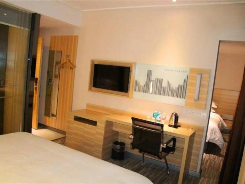 Bed in City Comfort Inn Hechi Bama Shouxiang Avenue