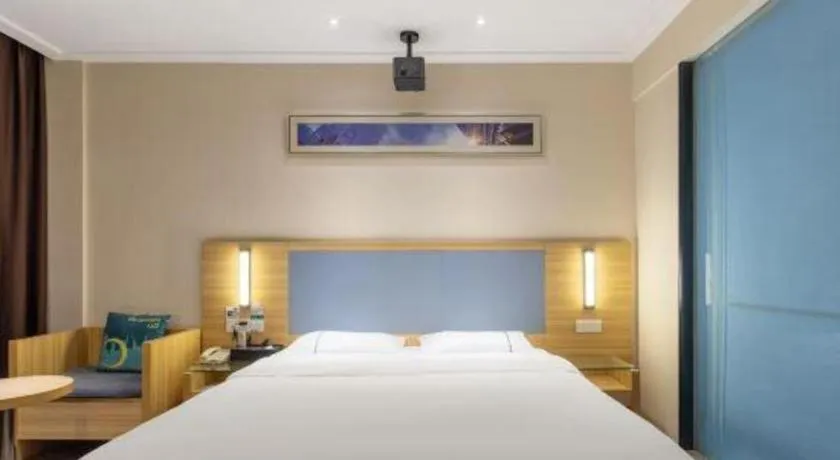 Bed in City Comfort Inn Hechi Bama Shouxiang Avenue
