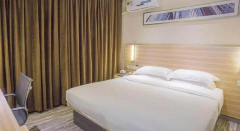 Bed in City Comfort Inn Hechi Bama Shouxiang Avenue