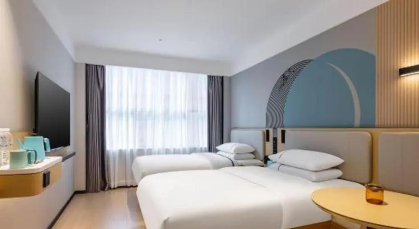 Bed in City Comfort Inn Hechi Bama Shouxiang Avenue