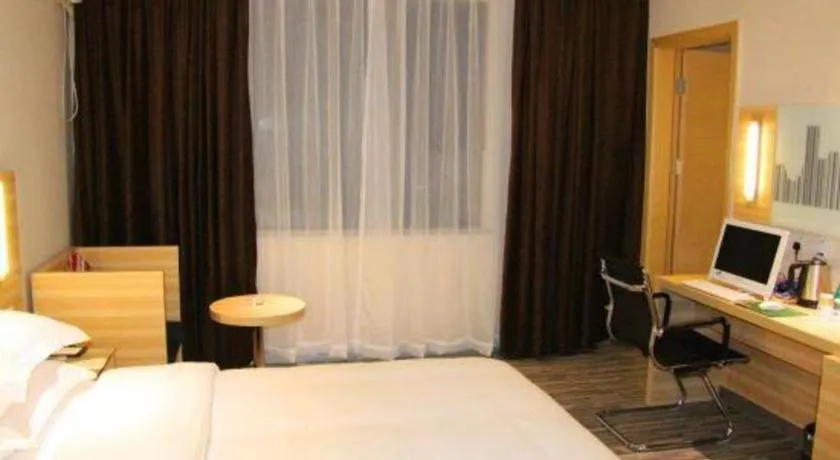 Bed in City Comfort Inn Hechi Bama Shouxiang Avenue