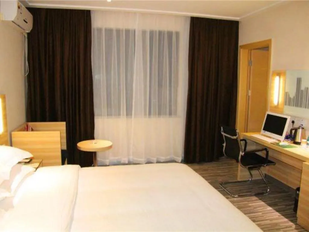 Bed in City Comfort Inn Hechi Bama Shouxiang Avenue