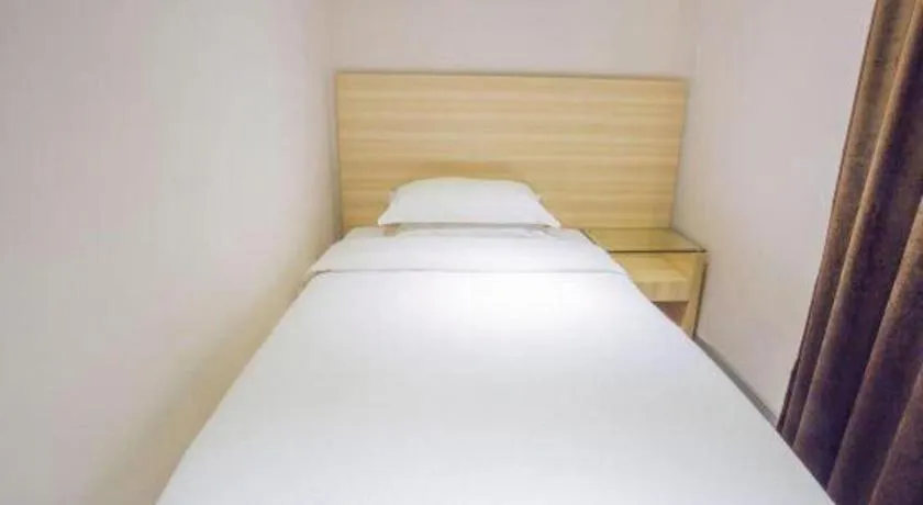 Bed in City Comfort Inn Hechi Bama Shouxiang Avenue