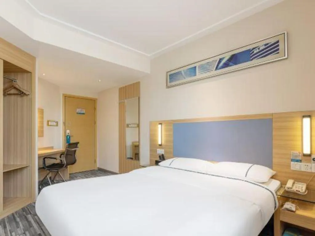Bed in City Comfort Inn Hechi Bama Shouxiang Avenue