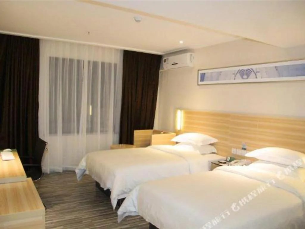 Bed in City Comfort Inn Hechi Bama Shouxiang Avenue