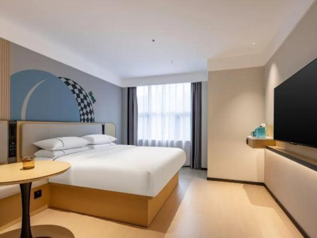 Bed in City Comfort Inn Hechi Bama Shouxiang Avenue