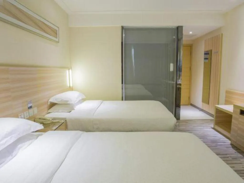 Bed in City Comfort Inn Hechi Bama Shouxiang Avenue