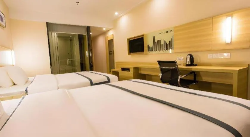 Bed in City Comfort Inn Chongzuo Youyi Avenue