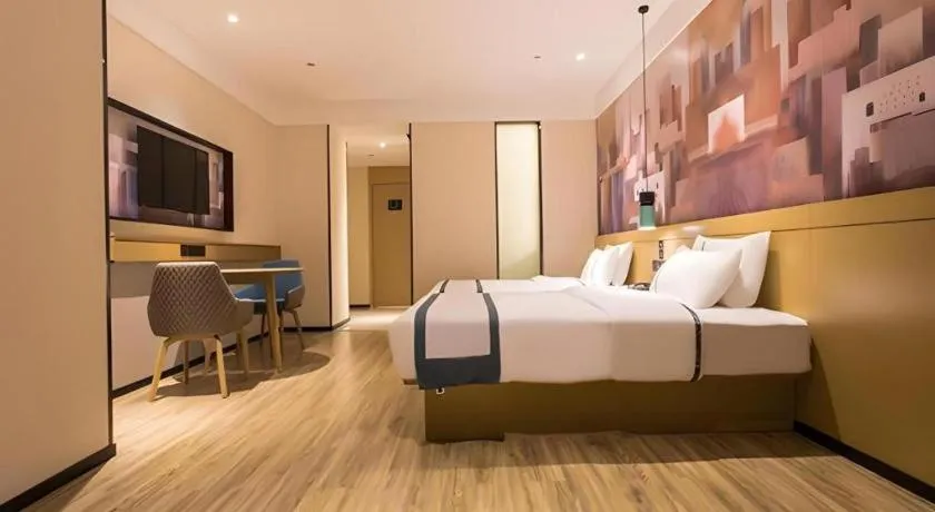 Bed in City Comfort Inn Nanning International Exhibition Jinhu Plaza