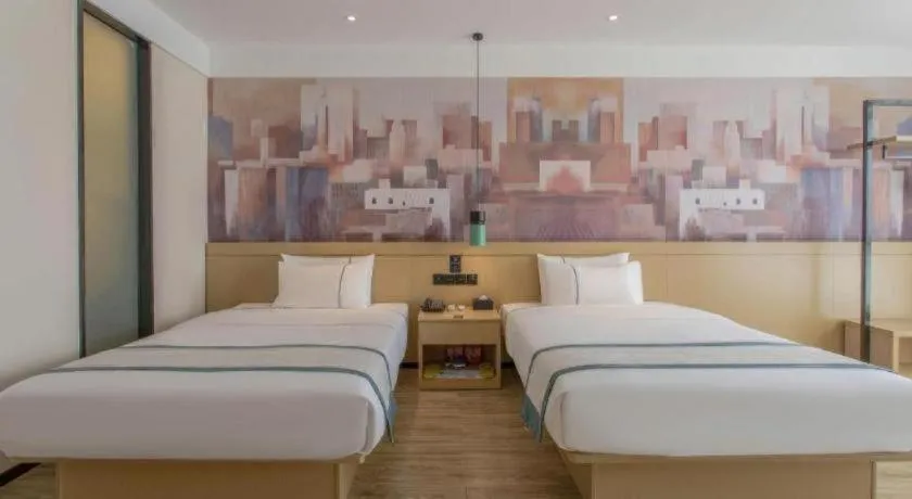 Bed in City Comfort Inn Nanning International Exhibition Jinhu Plaza