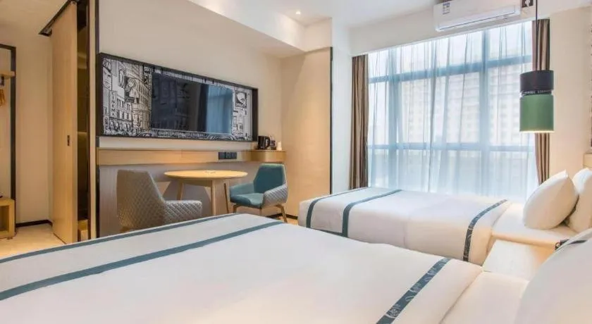 Bed in City Comfort Inn Nanning International Exhibition Jinhu Plaza