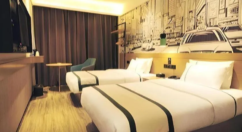 Bed in City Comfort Inn Suizhou Bingzi Wanda