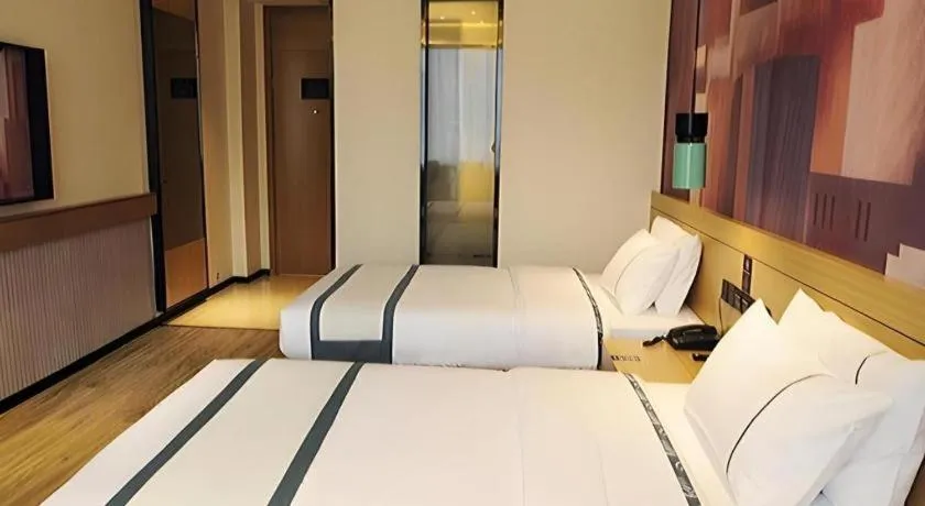 Bed in City Comfort Inn Suizhou Bingzi Wanda