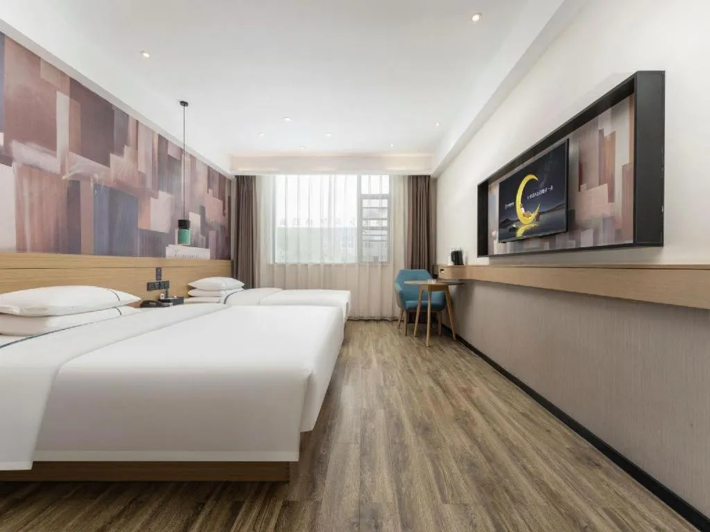 Bed in City Comfort Inn Suizhou Bingzi Wanda