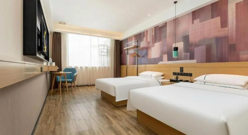 Bed in City Comfort Inn Suizhou Bingzi Wanda