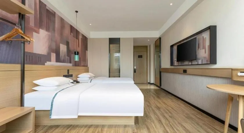 Bed in City Comfort Inn Suizhou Bingzi Wanda