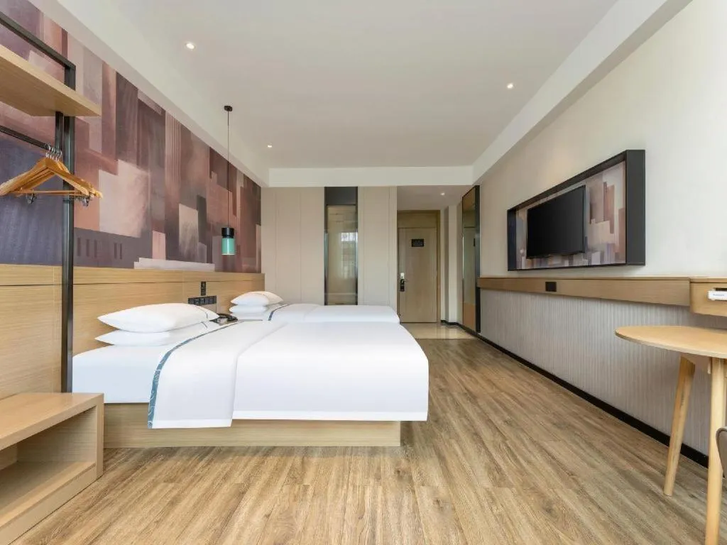 Bed in City Comfort Inn Suizhou Bingzi Wanda