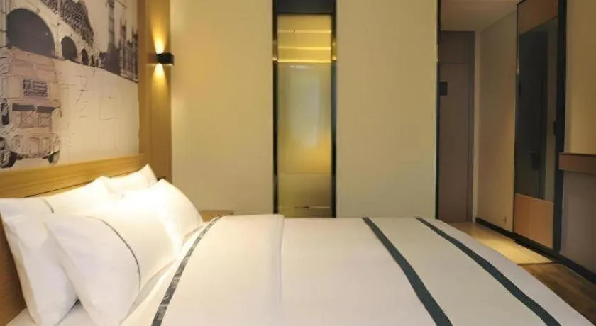 Bed in City Comfort Inn Suizhou Bingzi Wanda