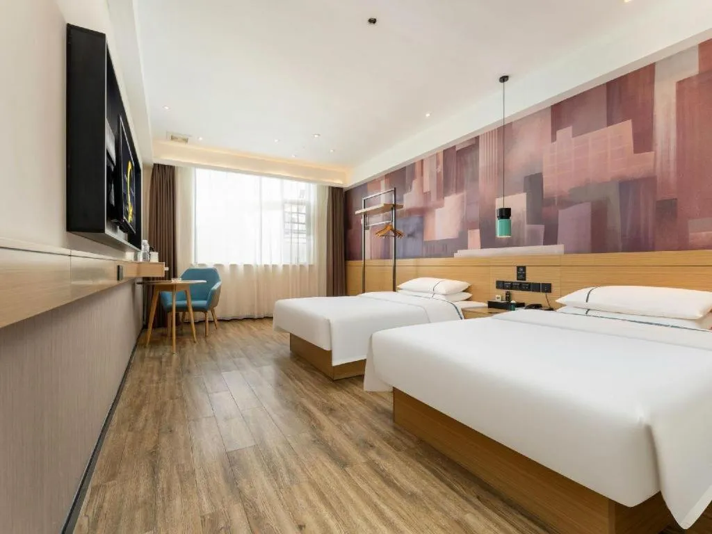 Bed in City Comfort Inn Suizhou Bingzi Wanda