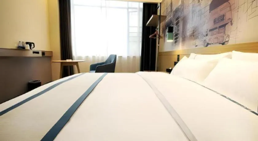 Bed in City Comfort Inn Suizhou Bingzi Wanda