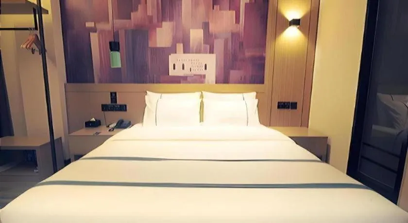 Bed in City Comfort Inn Suizhou Bingzi Wanda