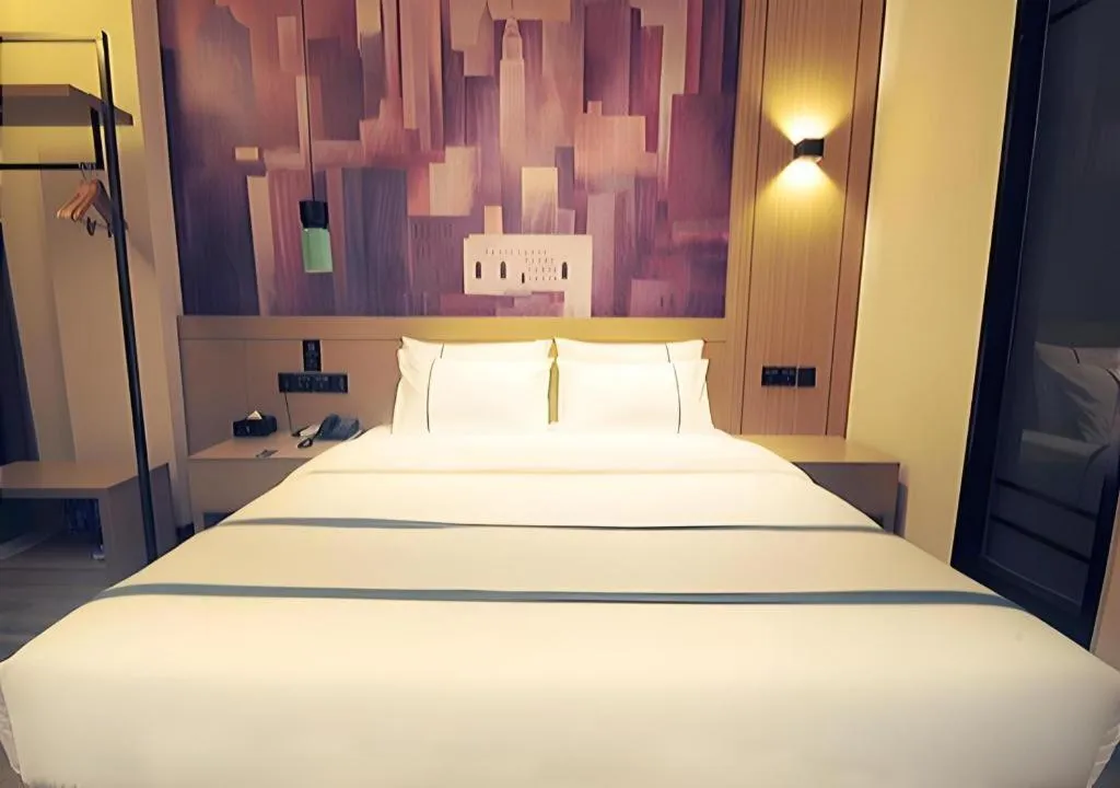 Bed in City Comfort Inn Suizhou Bingzi Wanda